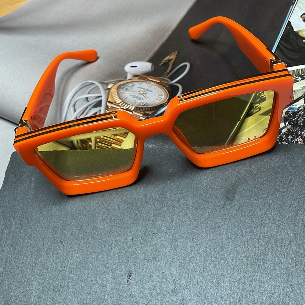 Orange and gold statement sunglasses